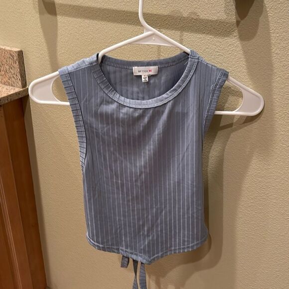 Better Be Tops - Better Be woman's silky baby blue striped shirt with a cut out in the back